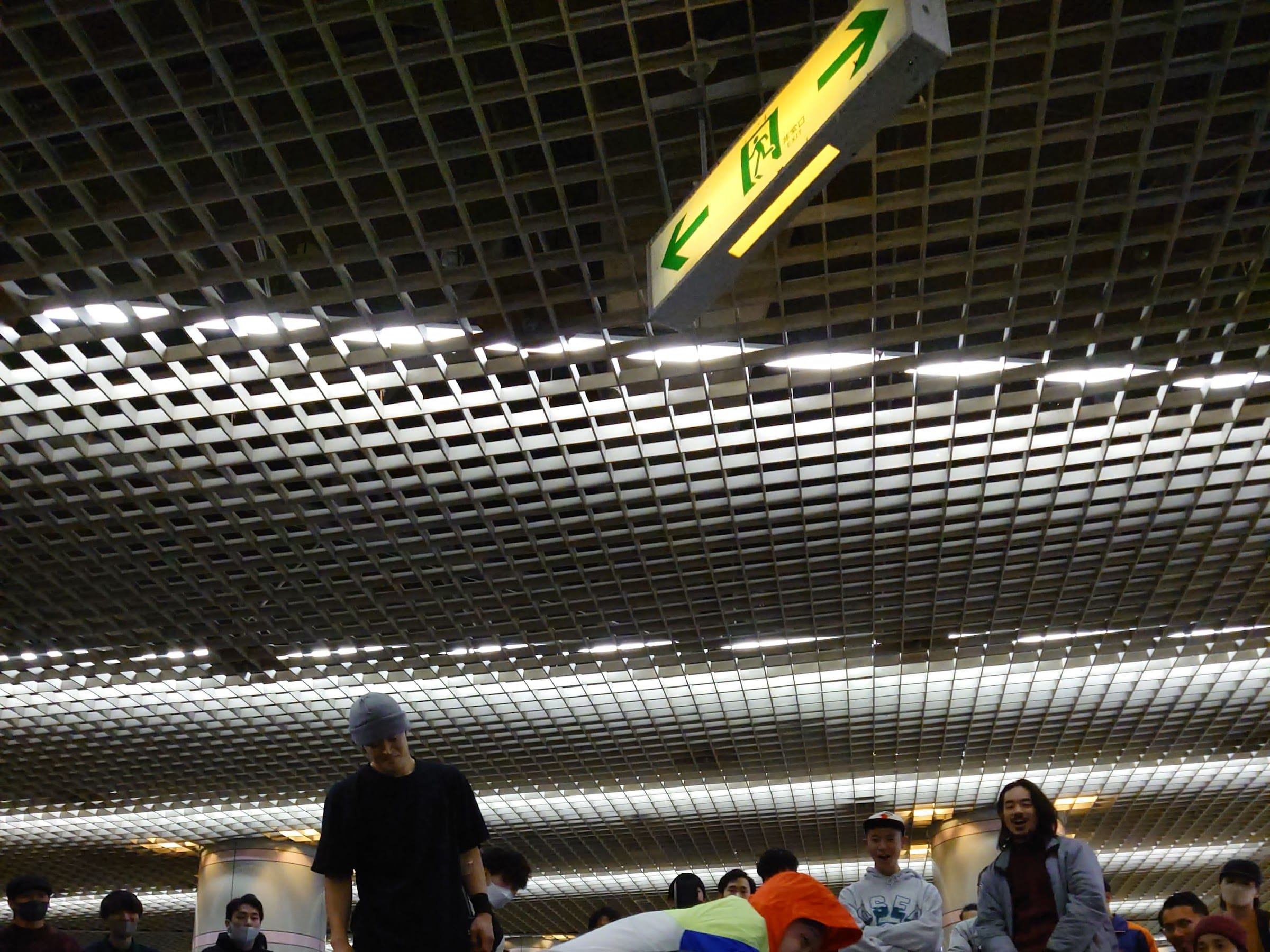 Wide shot of the Shiro-Chika plaza with its grid ceiling